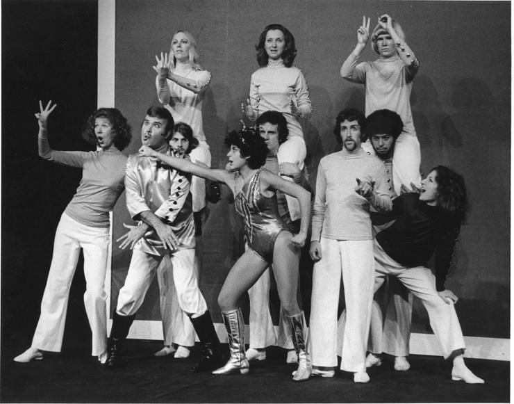 A black-and-white photo of early deaf theater actors in the United States in different poses facing the camera