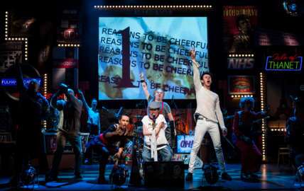 Photo of a performance by Graeae Theatre Company, showing various accessibility facilities Photo of a performance by Graeae Theatre Company, showing various accessibility facilities